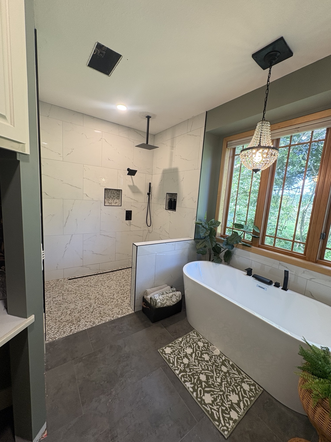New shower tile and freestanding tub