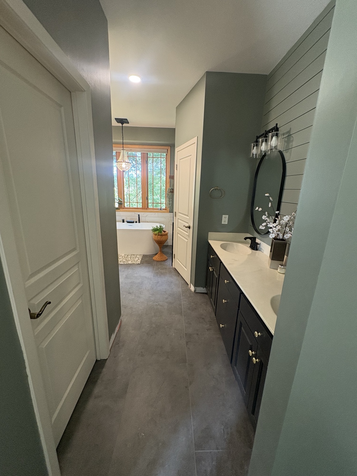 Renovated bathroom with vanity and flooring