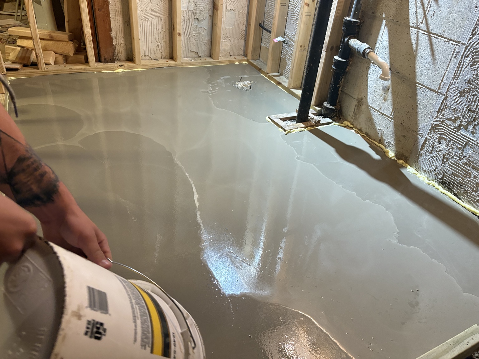 Freshly leveled concrete floor during renovation